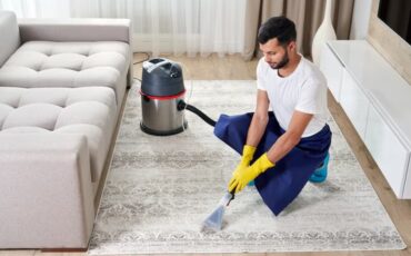 imgi_49_man-cleaning-carpet-living-room-using-vacuum-cleaner-home_130111-3883 Carpet Cleaning